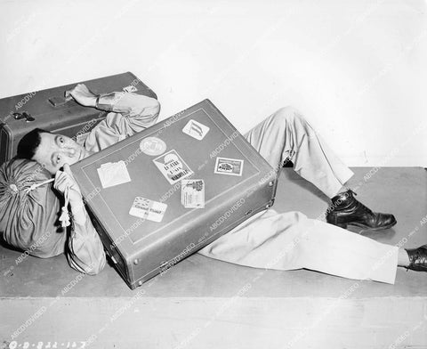 crp-12905 1945 Alexander Knox stumbles w the luggage film Over 21 crp-12905