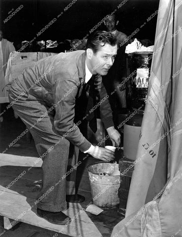 crp-13625 1937 candid Robert Montgomery at water cooler on set film Night Must Fall crp-13625