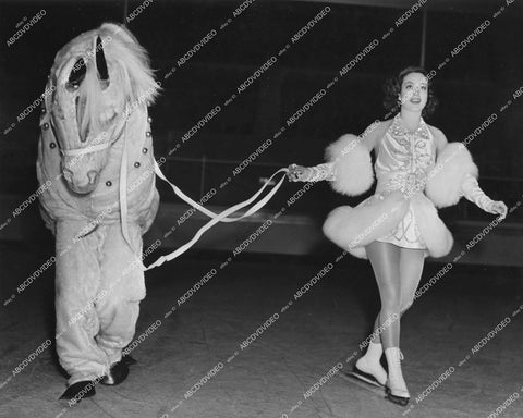 crp-13659 1939 ice skater Joan Crawford w men in horse suit comedy on ice film Ice Follies of 1939 crp-13659