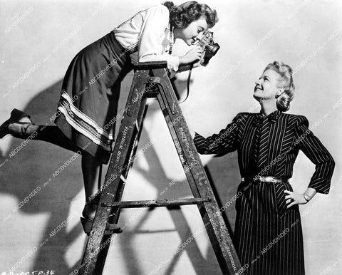crp-14362 1943 shutterbug Evelyn Keyes w camera & Ann Harding on set film Nine Girls crp-14362