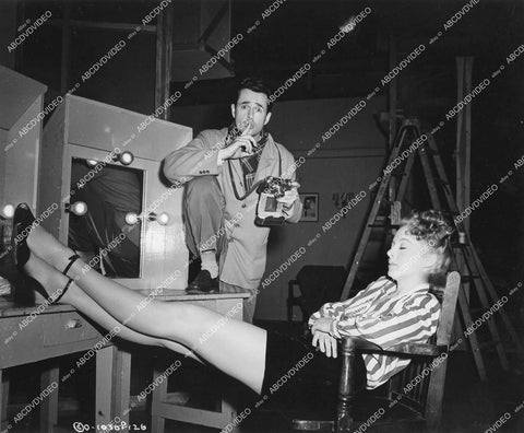 crp-14380 1946 Larry Parks snaps sleeping Evelyn Keyes stretching out legs on set film The Jolson Story crp-14380