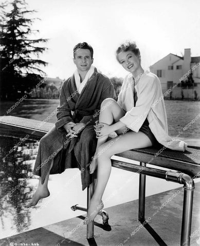 crp-14570 1946 Larry Parks, Evelyn Keyes in swimwear sitting on the diving board film The Jolson Story crp-14570