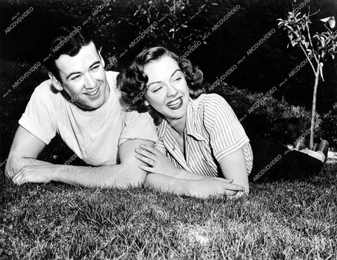 crp-15125 1942 Bill Carter, Leslie Brooks laying in the grass crp-15125
