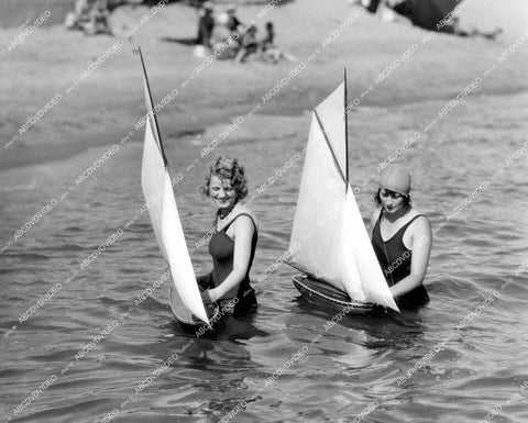 crp-15170 1930's ladies at Lido Isle Yacht Club practice w model boats to learn how to sail crp-15170