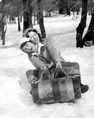 crp-15370 1930's two ladies have fun and go snow sledding crp-15370