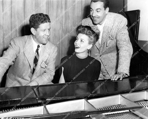 crp-16528 1946 Janet Blair, Cesar Romero, Rudy Vallee rehearse singing for radio show crp-16528