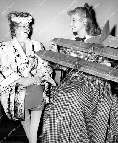 crp-16531 1946 Janet Blair & Mrs Regina Cleary Montgomery & aviation model of John Montgomery's glider airplane film Gallant Journey crp-16531