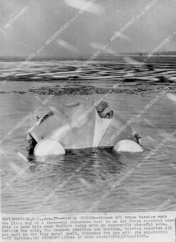 crp-1870 1960 Airman Bruce C Barwise tests his new Survival Capsule in Buffalo, NY crp-1870