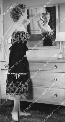 crp-01896 1951 Broadway star Brick Tone wears Dora Gottleib's matching camisole and petticoat in black batiste crp-01896