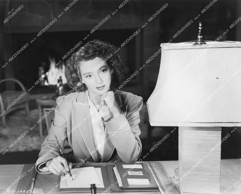 crp-18992 1944 Evelyn Keyes sitting at her desk film Nine Girls crp-18992