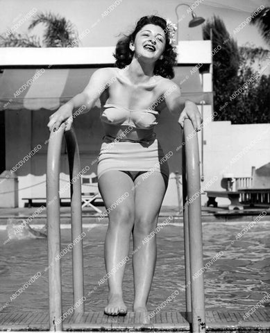 crp-19018 1943 Linda Spencer of Denver enjoys Los Angeles Ambassador outdoor Lido Swimming Pool crp-19018