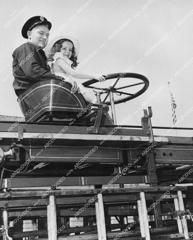 crp-02553 1940's cute little girl helps fireman steer vintage firetruck crp-02553