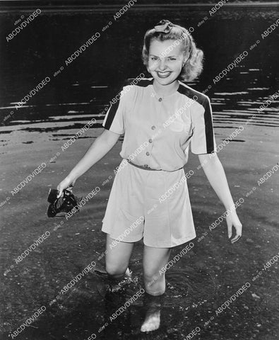 crp-03556 1942 pretty Elisabeth Fraser takes off her shoes to wade through water Commandos Strike at Dawn crp-03556
