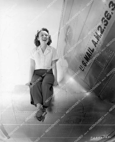 crp-04021 1938 Louise Campbell sitting on airplane wing film Men with Wings crp-04021