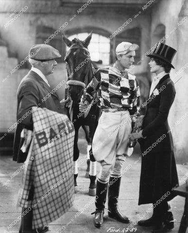 crp-05665 1928 June Collyer, Larry Kent in jockey outfit John Ford silent film Hangman's House crp-05665