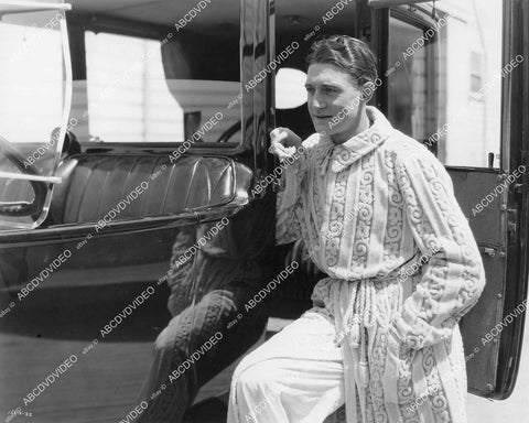 crp-05730 1921 Richard Dix in bathrobe leaning on new car on set silent film The Poverty of Riches crp-05730