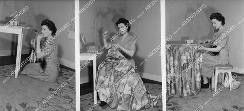 crp-00577 1944 Ruth Hussey busy sequence doing some home repairs herself crp-00577