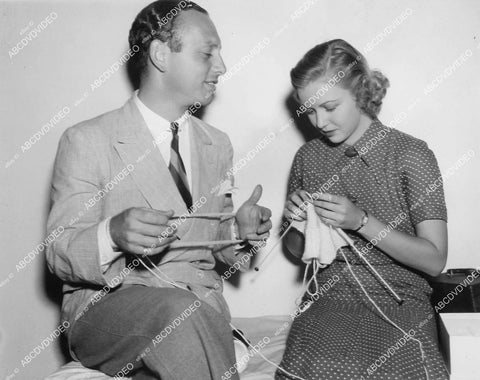 crp-05787 1936 J Walter Ruben holds yarn Cecilia Parker knitting between scenes film Old Hutch crp-05787