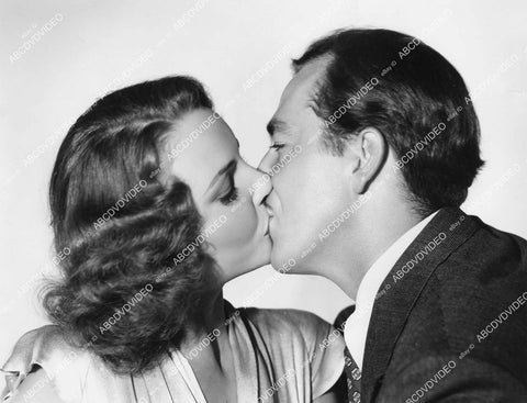 crp-05889 1941 Janet Blair kissing John Howard film Three Girls About Town crp-05889