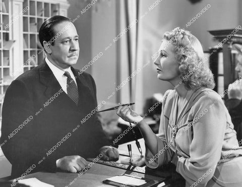 crp-05899 1941 Robert Benchley checks Binnie Barnes into hotel film Three Girls About Town crp-05899