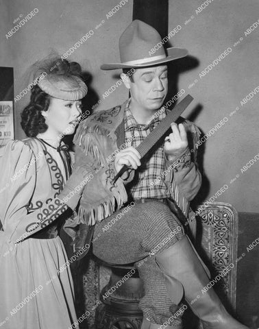 crp-06246 1942 Adele Mara watches in horror as Joe E Brown files his finger nails film Shut My Big Mouth crp-06246