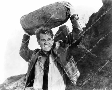 crp-06361 1961 Ron Randell ready to throw a boulder film Most Dangerous Man Alive crp-06361