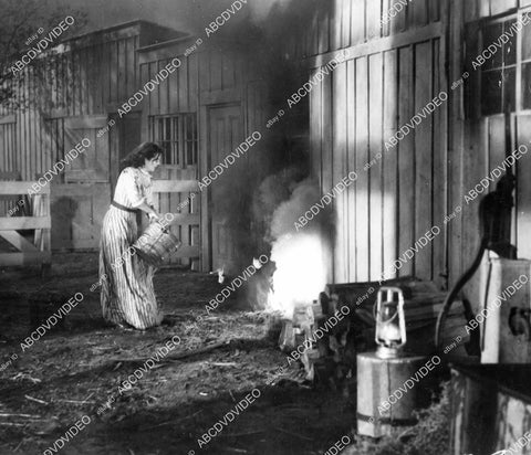 crp-07129 1949 Gail Russell putting out a fire film The Great Dan Patch crp-07129