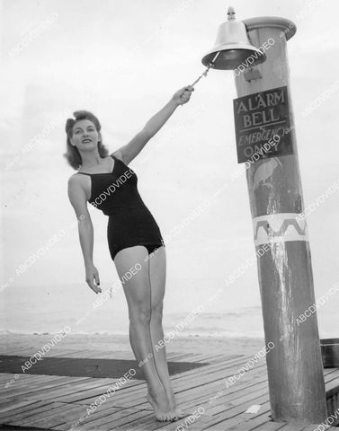 crp-00728 1944 sexy mom doubles as glamour girl Laura O'Banion rings alarm bell Miami Beach Fla crp-00728