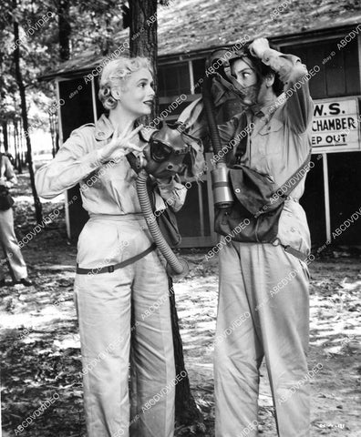 crp-07375 1953 Rosalind Russell, Marie Wilson try on gas masks film Never Wave at a WAC crp-07375
