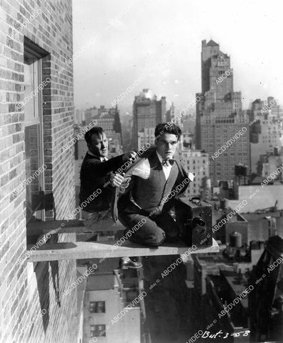 crp-07386 1928 Nick Stuart perched out over Los Angeles film News Parade crp-07386