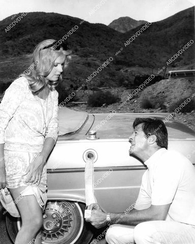 crp-07575 1966 Robert Culp uses Diana Hyland's skirt to light gas tank TV I Spy crp-07575