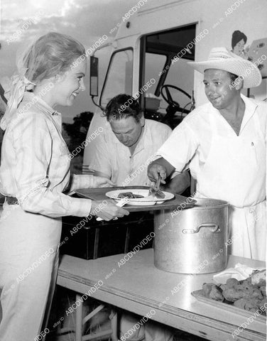 crp-07689 1962 NBC location cook Jack Troinoff feeds Terry Moore and crew TV Empire crp-07689