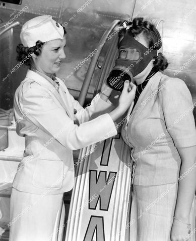 crp-08424 1940's aviation TWA stewardesses Bessie Penland, Barbara Stamps demo gas or oxygen mask crp-08424